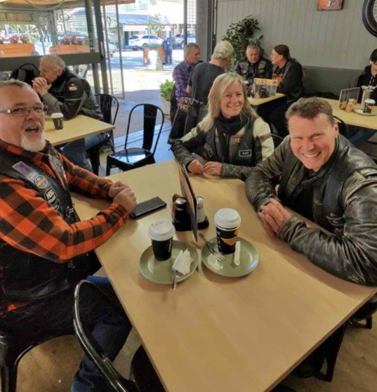 Three chapter members at Harry's Place Café