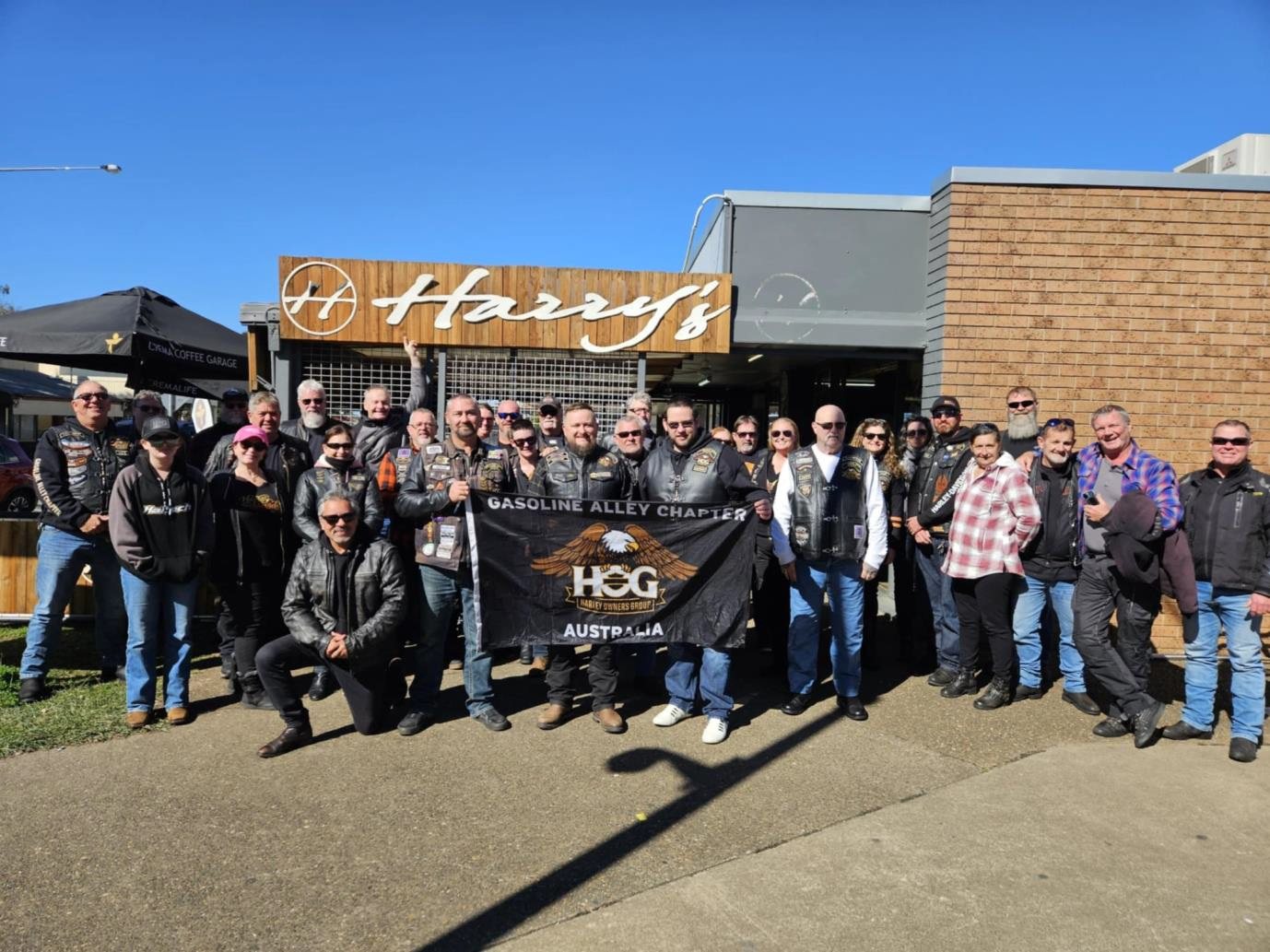 Gasoline Alley Chapter group outside Harry's Place Café
