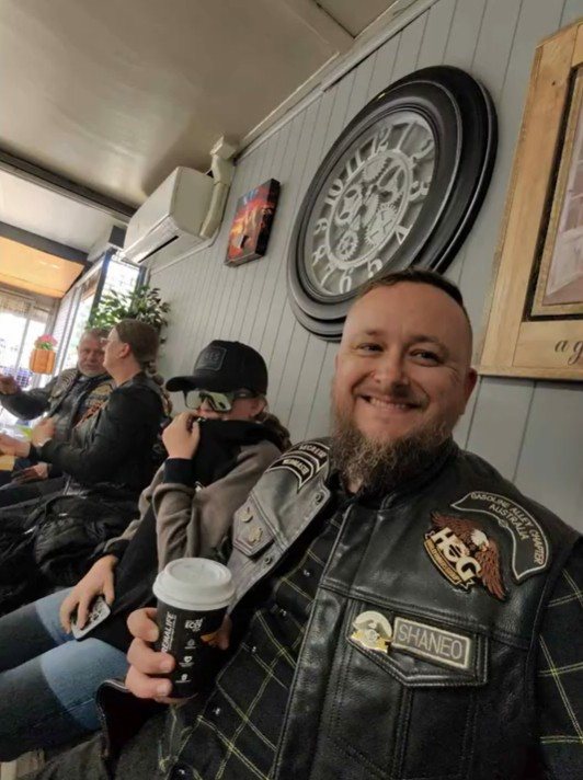 Shaneo and his daughter Zoe having coffee at Harry's Place Café