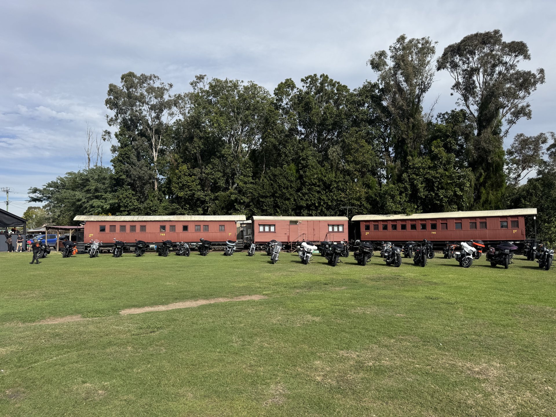 Old rail carriages and chapter motorcycles at Harrisville