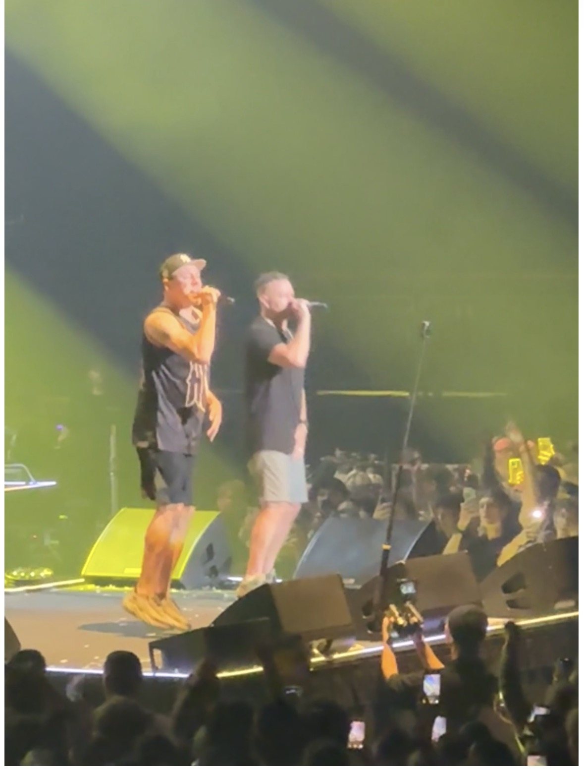 Two Hilltop Hoods performers together at the front of the stage