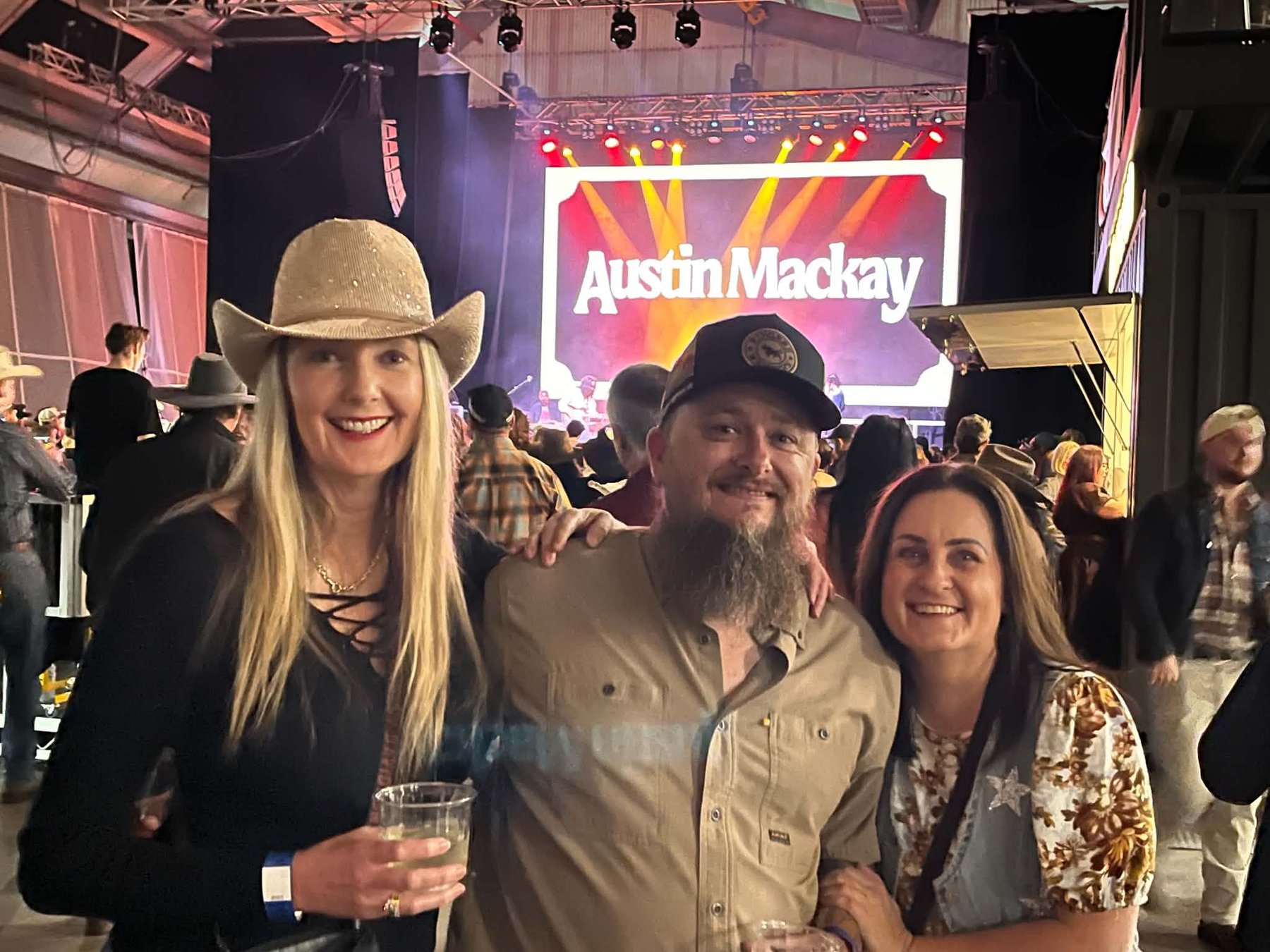 Friends together during Austin Mackay's performance