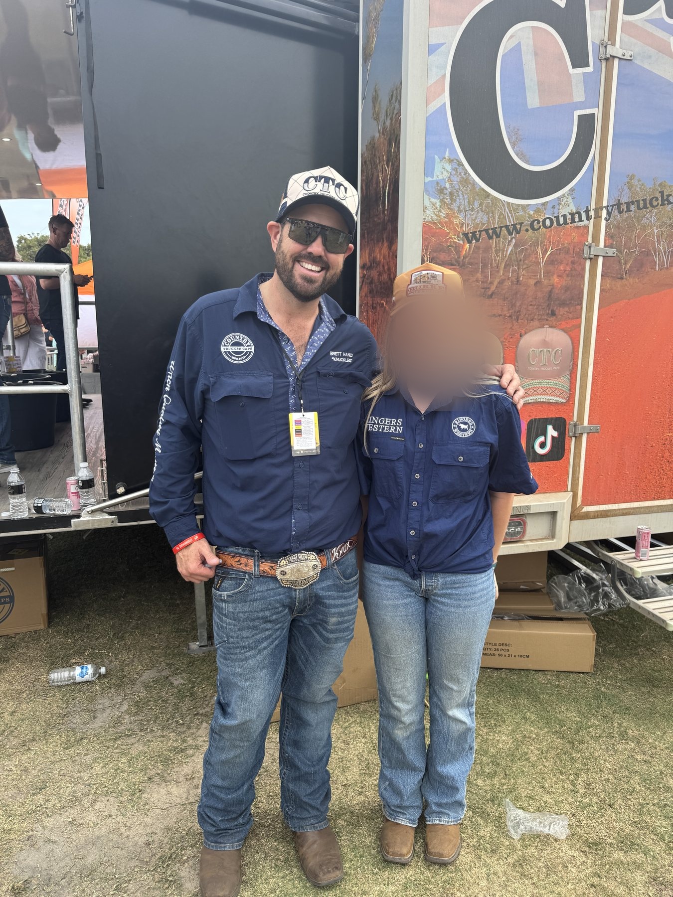 Zoe standing with Knuckles from Country Trucker Caps