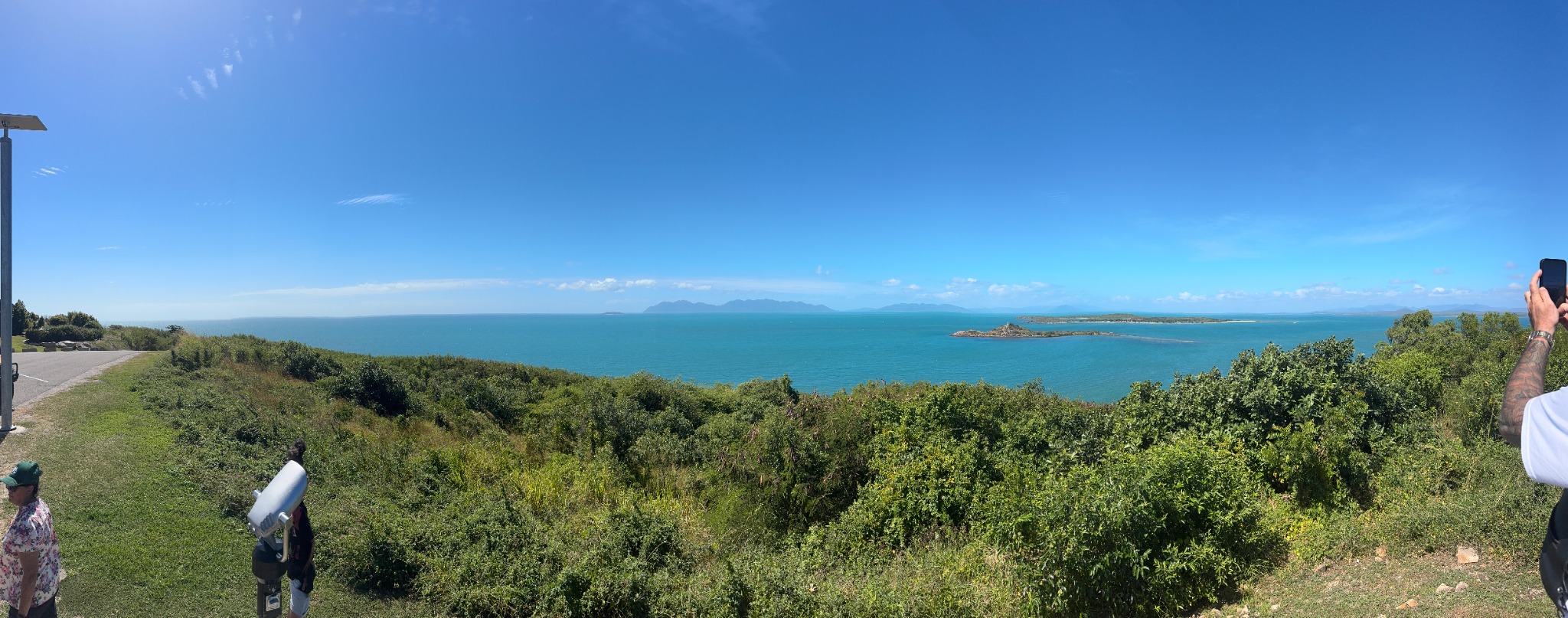 Panoramic view over the turquoise Whitsunday coast and islands.