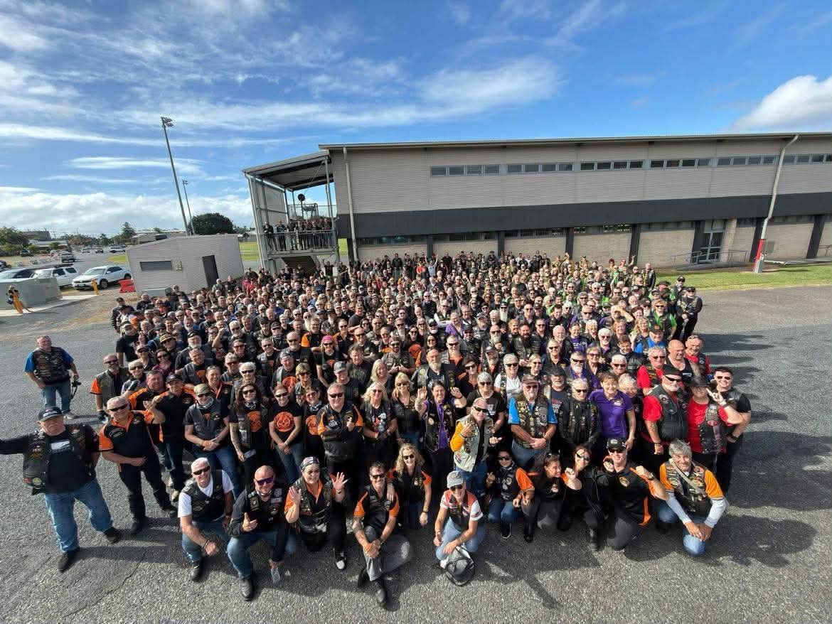 Queensland H.O.G. Rally attendees gathered for a large group photograph at Mackay Showgrounds.