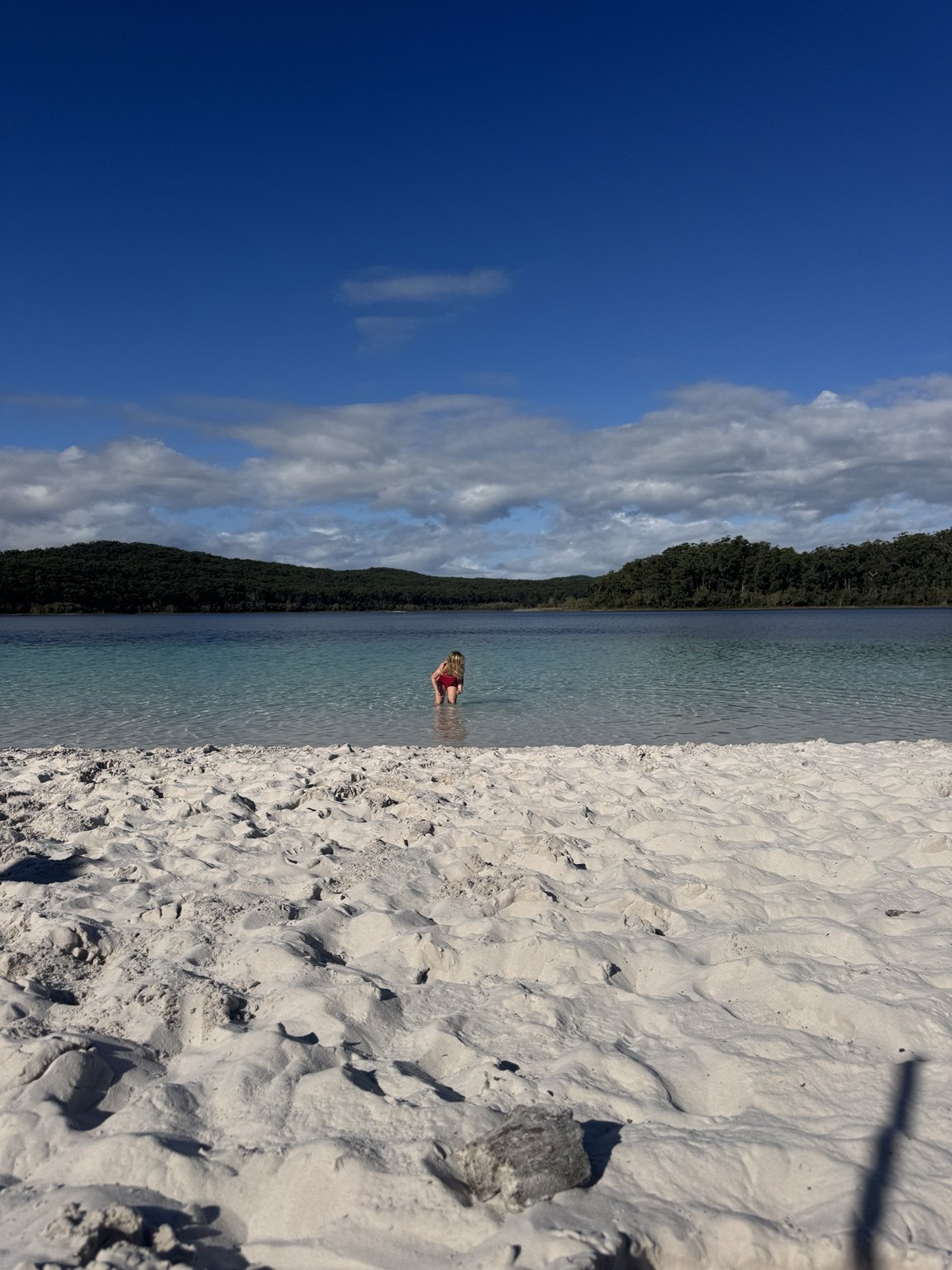 Lake McKenzie beach and clear water on K'gari.