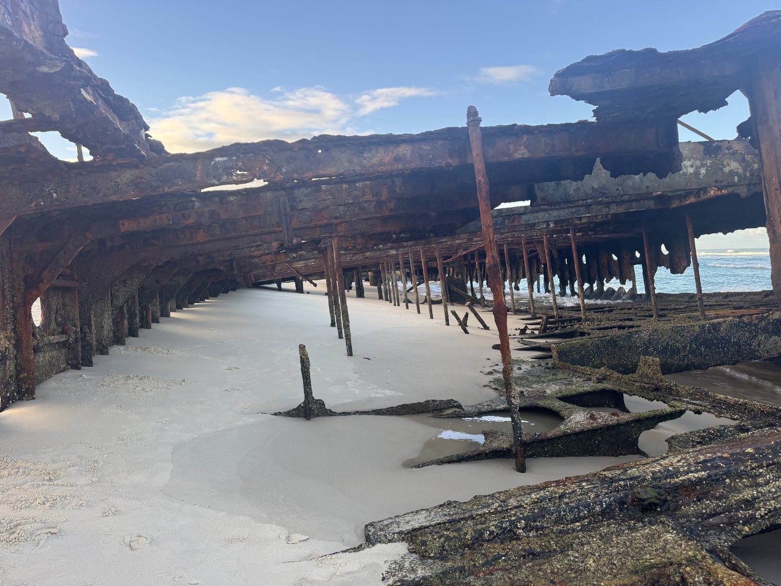 Close view through the rusted Maheno Shipwreck.