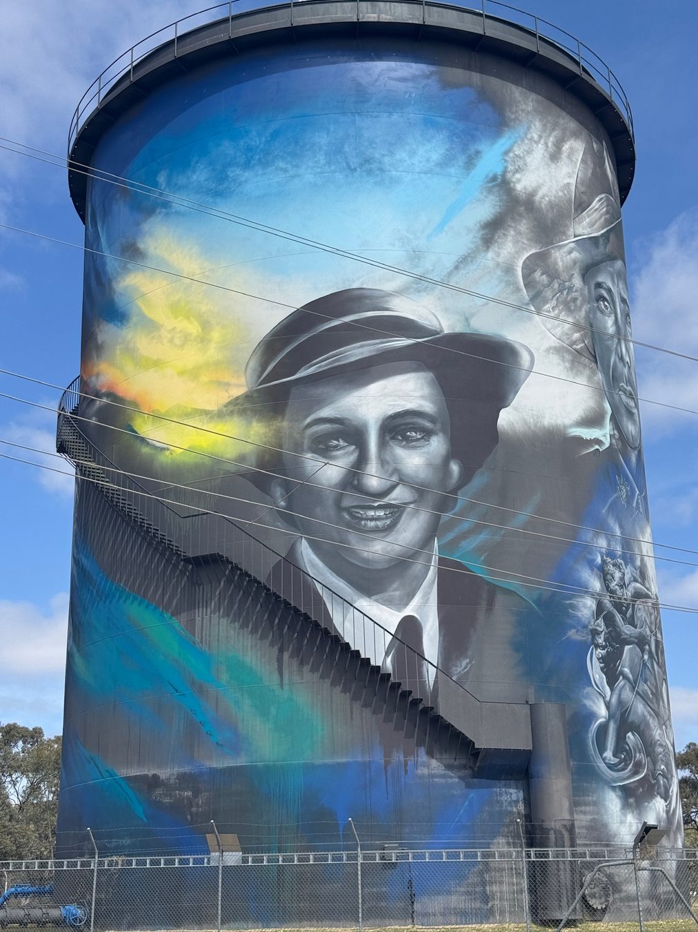 A close view of one of the painted Hay water towers.